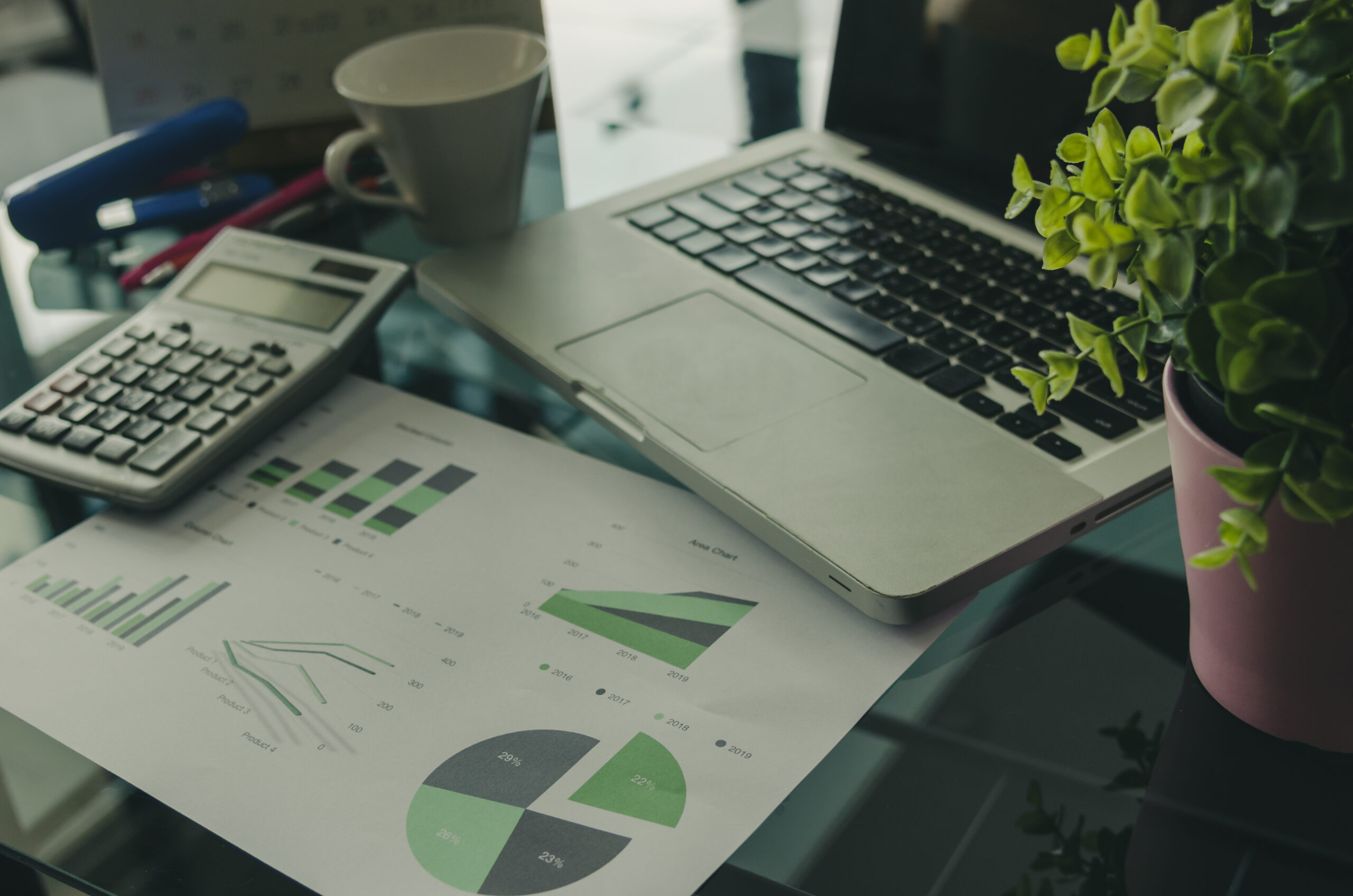 laptop with charts and graphs